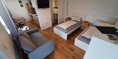 Monteurwohnung - TV - Röfingen - Wohnung 2 offener Wohnraum mit Einzelbetten  - Gästehaus Buberl