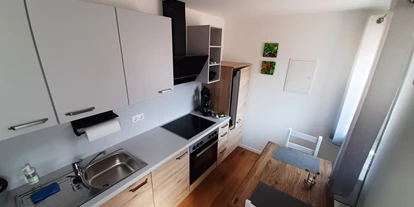 Monteurwohnung - Küche: eigene Küche - Walkertshofen - Küche und Eßbereich Wohnung 3 - Gästehaus Buberl