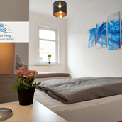 Monteurzimmer - Beispielbild Schlafzimmer - flex living - Monteurwohnungen in Stralsund (DEU|EN|PL|HU)