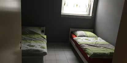 Monteurwohnung - Einzelbetten - Hessen - Schlafzimmer 1 - Miller & Ihrig Immobilien