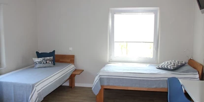 Monteurwohnung - Zimmertyp: Einzelzimmer - Lünne - Schlafzimmer mit 3 Einzelbetten - Ferienhaus "NaturPur"