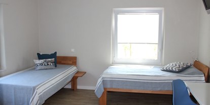 Monteurwohnung - Zimmertyp: Mehrbettzimmer - Münsterland - Schlafzimmer mit 3 Einzelbetten - Ferienhaus "NaturPur"