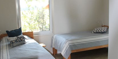 Monteurwohnung - Zimmertyp: Doppelzimmer - Ibbenbüren - Schlafzimmer mit 2 Einzelbetten - Ferienhaus "NaturPur"