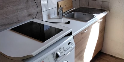 Monteurwohnung - Einzelbetten - Brandenburg Süd - Küche mit Waschmaschine - Dachsloch