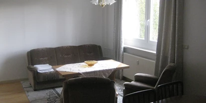 Monteurwohnung - Einzelbetten - Thümmlitzwalde - Schlafcouch im Wohnzimmer - St. Aegidienblick