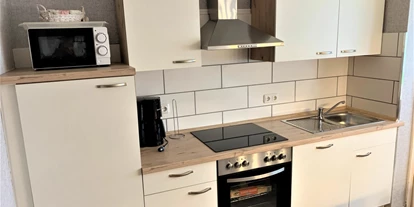 Monteurwohnung - WLAN - Padingbüttel - Gut ausgestattete Küchenzeile. - ANDY NORDSEE: 2 Schlafzimmerwohnung im Urlaubsparadies