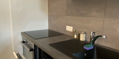 Monteurwohnung - Küche: eigene Küche - vollausgestattete Küche + Geschirrspüler - Monteurwohnungen in Klagenfurt am Wörthersee