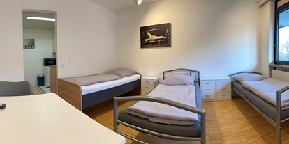 Monteurwohnung - Bettwäsche: Bettwäsche inklusive - Nünschweiler - Schlafzimmer, HomeRent Unterkunft in Zweibrücken - HomeRent in Zweibrücken