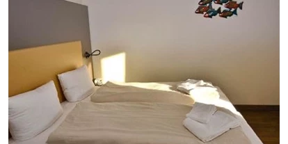 Monteurwohnung - Zimmertyp: Doppelzimmer - Nordseeküste - Schlafzimmer, Doppelbett  - Moin im Deichgraf