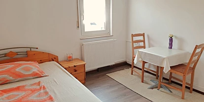 Monteurwohnung - Küche: Gemeinschaftsküche - Lauffen am Neckar Heilbronn - Doppelbettzimmer für max 2 Personen mit ein Doppelbett - Gästezimmer Viens Besigheim