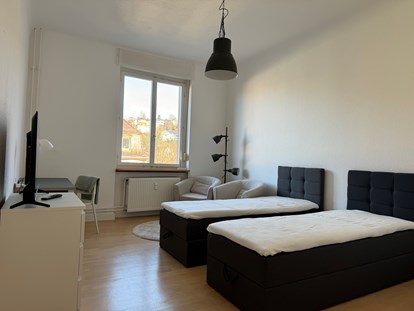 Monteurwohnung - Einzelbetten - Mönsheim - Schlafzimmer - Quartiere auf Zeit 