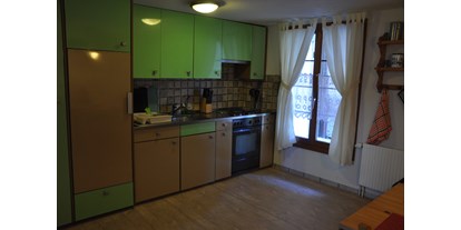 Monteurwohnung - Badezimmer: eigenes Bad - PLZ 8766 (Schweiz) - Küchenzeile Kaminzauber - Ferienwohnung Alter Raaben