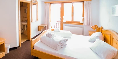 Monteurwohnung - Einzelbetten - Graubünden - Hotel Postigliun