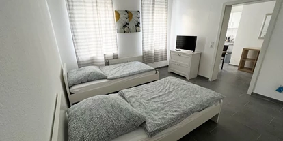 Monteurwohnung - TV - Vettelschoß - Schlafzimmer, HomeRent Unterkunft in Eitorf - HomeRent in Eitorf