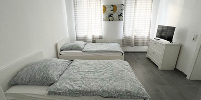 Monteurwohnung - Einzelbetten - Kraam - Schlafzimmer, HomeRent Unterkunft in Eitorf - HomeRent in Eitorf
