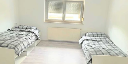 Monteurwohnung - Einzelbetten - Köln Mühlheim - Schlafzimmer, HomeRent Unterkunft in Leverkusen - HomeRent in Leverkusen