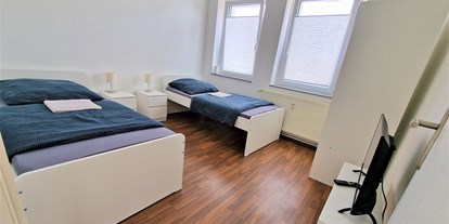 Monteurwohnung - Bettwäsche: Bettwäsche inklusive - Vettweiß - Schlafzimmer, HomeRent Unterkunft in Düren - HomeRent in Düren