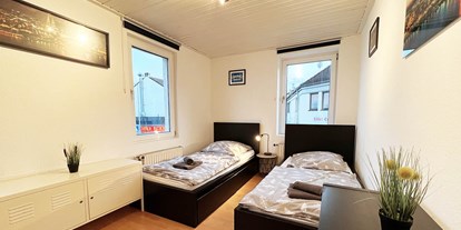 Monteurwohnung - Einzelbetten - Nettersheim - Schlafzimmer, HomeRent Unterkunft in Mechernich - HomeRent in Mechernich