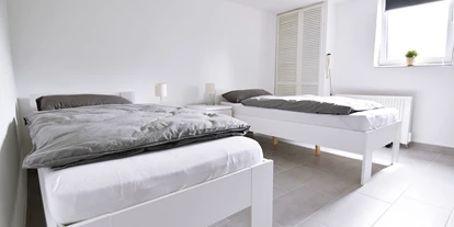 Monteurwohnung - Bettwäsche: Bettwäsche inklusive - PLZ 50676 (Deutschland) - Schlafzimmer, HomeRent Unterkunft in Wesseling - HomeRent in Wesseling