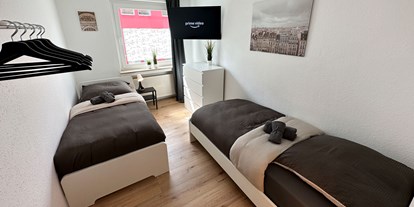 Monteurwohnung - Balkon - Lotte - Schlafzimmer, HomeRent Unterkunft in Osnabrück - HomeRent in Osnabrück