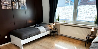 Monteurwohnung - Bettwäsche: Bettwäsche inklusive - Lotte - Schlafzimmer, HomeRent Unterkunft in Osnabrück - HomeRent in Osnabrück