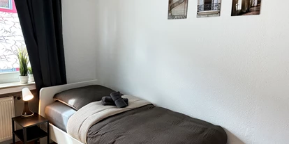 Monteurwohnung - Bissendorf - Schlafzimmer, HomeRent Unterkunft in Osnabrück - HomeRent in Osnabrück