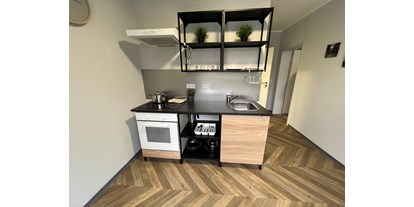 Monteurwohnung - Zimmertyp: Mehrbettzimmer - Helsa - Küche - Apartments am Parkschönfeld