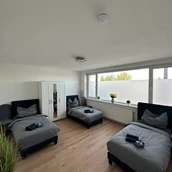 Monteurzimmer: Schlafzimmer 2 - Gemütliche Unterkunft 90m² mit 6 Einzelbetten 