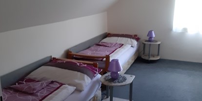 Monteurwohnung - Badezimmer: Gemeinschaftsbad - Taggenbrunn - Schlafzimmer mit 2 Einzelbetten - Pogatschnig