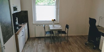 Monteurwohnung - Kühlschrank - Billerbeck Billerbeck - Zimmer mit Küche zeile  - 1 Zimmer Appartement