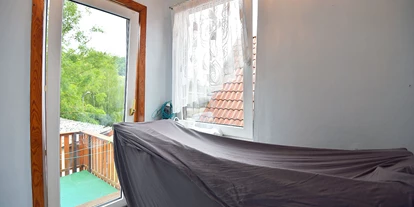 Monteurwohnung - Hund erlaubt - Angelroda - Wäschetrockner und Zugang zum Balkon - Haus Markus