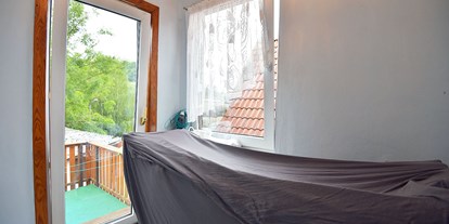 Monteurwohnung - Küche: eigene Küche - Thüringen Süd - Wäschetrockner und Zugang zum Balkon - Haus Markus
