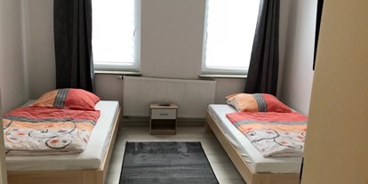 Monteurwohnung - Einzelbetten - Detailfoto ( 2 Bett Zimmer) in der 3 Raum Wohnun  Stadtteil Lehe ( Leher Bahnhof )  - Cityhome Bremerhaven