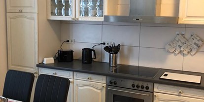 Monteurwohnung - Waschmaschine - Detailfoto ( Küche ) einer 3 Raum Wohnung . Stadtteil Lehe ( Leher Bahnhof )  - Cityhome Bremerhaven