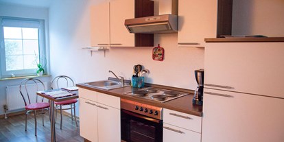 Monteurwohnung - Niedersachsen - Essbereich und Küche Wohnung  - Apartment Haus am Grün