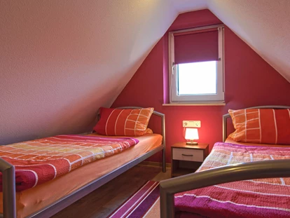 Monteurwohnung - Bettwäsche: Bettwäsche inklusive - Lipprechterode - Extra Schlafzimmer DG  - Apartment Haus am Grün