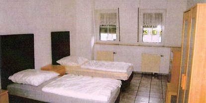 Monteurwohnung - Badezimmer: eigenes Bad - Jüchen - Einzelbetten der Monteurunterkunft in Elsdorf - 6 Monteurzimmer und 2 kl. Appartements für Monteure