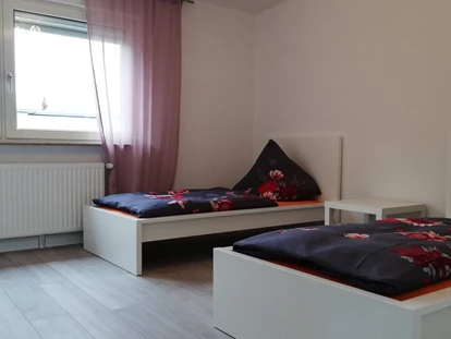 Monteurwohnung - Einzelbetten - PLZ 27809 (Deutschland) - Schlafzimmer im 1. Obergeschoss - sleep in Bremen