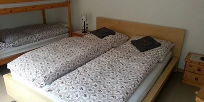 Monteurwohnung - Zimmertyp: Doppelzimmer - Dürrröhrsdorf-Dittersbach - Vier gemütliche Schlafplätze im Untergeschoss (mit Fenstern) - Dopplestöckiges Ferienhaus in Loschwitz