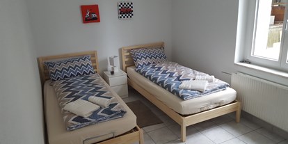 Monteurwohnung - Badezimmer: Gemeinschaftsbad - Niederbipp - Casa Carmela Apartments