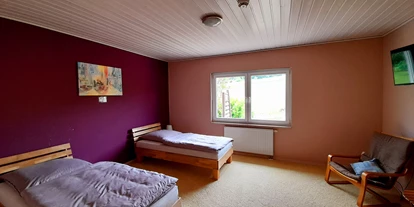 Monteurwohnung - Küche: Gemeinschaftsküche - Scheden - Schlafzimmer 1.OG, Nr. 4 - Ferienhaus Am Hemkeberg