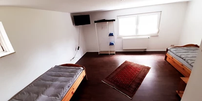Monteurwohnung - Küche: Küchenmitbenutzung - Scheden - Schlafzimmer im EG, Nr. 1 - Ferienhaus Am Hemkeberg
