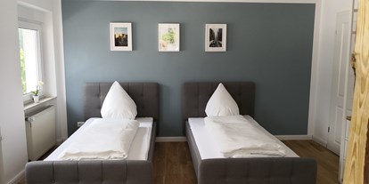 Monteurwohnung - Zimmertyp: Einzelzimmer - PLZ 56470 (Deutschland) - Schlafzimmer Ferienwohnung Stadtblick - Storch Appertements