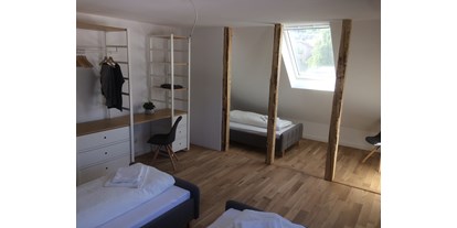 Monteurwohnung - Badezimmer: eigenes Bad - Weltersburg - Schlafzimmer Ferienwohnung Stadtblick - Storch Appertements