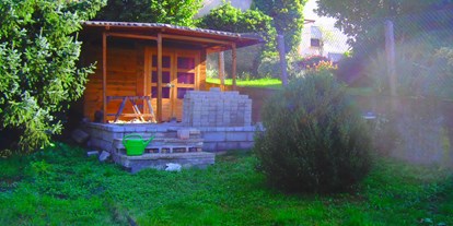 Monteurwohnung - Waschmaschine - Lohrheim - Garten mit Hütte in der Monteurunterkunft in Runkel an der Lahn. - Dach-Studio Runkel