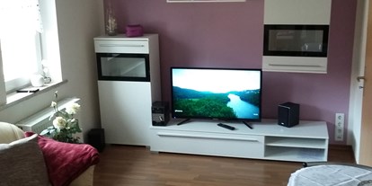Monteurwohnung - Kühlschrank - Wernigerode - Wohnzimmer  - Hexenstübchen/ moderne Ferienwohnung 