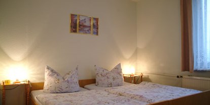 Monteurwohnung - WLAN - Hörselberg - Die Betten können als Einzel- und als Doppelbett genutzt werden. - Ferienwohnung "Zum Fuchsbau"