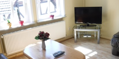 Monteurwohnung - Zimmertyp: Doppelzimmer - Söhrewald - Fernsehraum der Arbeiterwohnung in Spangenberg. - Haus Siegner  
