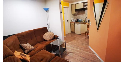 Monteurwohnung - Zimmertyp: Doppelzimmer - Brieden - Küchen- und Relaxbereich der Ferienwohnung (4 Personen, auch für Monteure geeignet) - Pension Linkemühle Niederfell