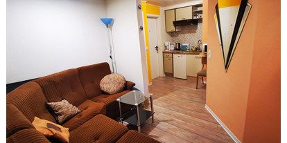Monteurwohnung - Zimmertyp: Doppelzimmer - Thür - Küchen- und Relaxbereich der Ferienwohnung (4 Personen, auch für Monteure geeignet) - Pension Linkemühle Niederfell